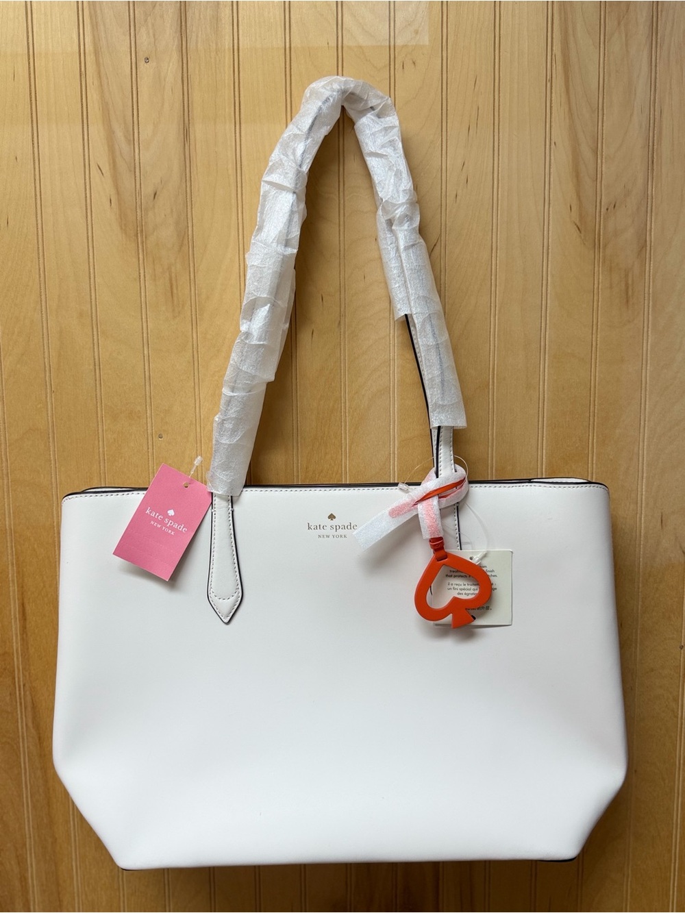 NWT Kate Spade New York White Leather Tote Bag with Orange Charm - Picture 2 of 7